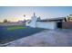Home features a backyard with artificial turf and gravel at 1873 E Ellis Dr, Tempe, AZ 85282