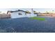 Artificial turf and gravel backyard with a home at 1873 E Ellis Dr, Tempe, AZ 85282