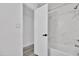 Bathroom with marble shower and a white bathtub at 1873 E Ellis Dr, Tempe, AZ 85282
