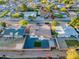 Aerial view of a single-Gathering home with a large backyard in a residential neighborhood at 1873 E Ellis Dr, Tempe, AZ 85282
