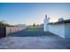 Artificial turf and gravel backyard with a home at 1873 E Ellis Dr, Tempe, AZ 85282