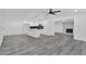 Modern kitchen with white cabinets and island at 1873 E Ellis Dr, Tempe, AZ 85282