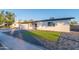 Charming single-story home with artificial turf at 1873 E Ellis Dr, Tempe, AZ 85282