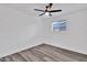 Well lit bedroom with grey flooring and a ceiling fan at 1873 E Ellis Dr, Tempe, AZ 85282