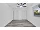 Spacious bedroom with ceiling fan and double closets at 1873 E Ellis Dr, Tempe, AZ 85282