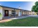 Charming home with a covered porch and stone accents at 1015 E 3Rd Ave, Mesa, AZ 85204