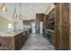 Spacious kitchen featuring granite countertops and dark wood cabinetry at 43320 N 11Th St, New River, AZ 85087