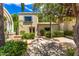 Home exterior with stucco walls and arched entryway at 94 Biltmore Est, Phoenix, AZ 85016