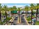 Aerial view of Biltmore Fashion Park's entrance and parking lot at 94 Biltmore Est, Phoenix, AZ 85016