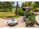 Outdoor patio with seating area, built-in grill, and scenic mountain views at 94 Biltmore Est, Phoenix, AZ 85016
