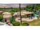 Single story home with pool, patio and lush landscaping at 94 Biltmore Est, Phoenix, AZ 85016
