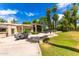 Large patio with seating area and expansive lawn at 94 Biltmore Est, Phoenix, AZ 85016