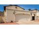 House exterior, featuring a garage and landscaping at 4760 W Wahalla Ln, Glendale, AZ 85308