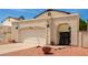 Spanish style home with arched entryway and two-car garage at 4760 W Wahalla Ln, Glendale, AZ 85308