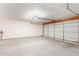 Attached garage with light-colored walls and flooring at 4760 W Wahalla Ln, Glendale, AZ 85308