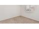 Bright bedroom with neutral carpeting and window shutters at 4760 W Wahalla Ln, Glendale, AZ 85308
