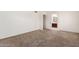 Bright bedroom with carpet flooring and access to bathroom at 4760 W Wahalla Ln, Glendale, AZ 85308