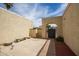 Private courtyard with stone benches and a gated entrance at 4760 W Wahalla Ln, Glendale, AZ 85308