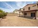 Large backyard with covered patio and block wall at 4760 W Wahalla Ln, Glendale, AZ 85308