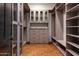 Large walk-in closet with ample shelving and drawers at 6737 E Rockaway Hills Dr, Cave Creek, AZ 85331