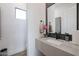 Contemporary bathroom with floating vanity and modern fixtures at 16032 E Dale Ln, Scottsdale, AZ 85262