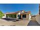 View of backyard with patio and gravel landscaping at 9623 W Wescott Dr, Peoria, AZ 85382