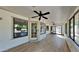 Sunroom with tile flooring and access to backyard at 9623 W Wescott Dr, Peoria, AZ 85382