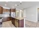 Kitchen boasts granite countertops and stainless steel appliances at 5557 W Buckskin Trl, Phoenix, AZ 85083