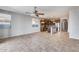 Open kitchen with island and dark wood cabinets at 5557 W Buckskin Trl, Phoenix, AZ 85083