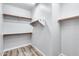 Large walk-in closet with ample shelving and hanging space at 5557 W Buckskin Trl, Phoenix, AZ 85083