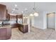 Spacious kitchen featuring granite countertops and stainless steel appliances at 5557 W Buckskin Trl, Phoenix, AZ 85083