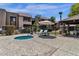 Community spa and pool area with lounge chairs and barbecue grills at 5995 N 78Th St # 2079, Scottsdale, AZ 85250