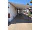 Covered carport with adjacent storage at 9501 E Broadway Rd # 221, Mesa, AZ 85208