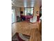 Spacious living area with hardwood floors and a built-in mirrored wall at 9501 E Broadway Rd # 221, Mesa, AZ 85208