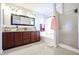 Bathroom with double sinks, granite countertop, and shower at 17511 N Kimberly Way, Surprise, AZ 85374