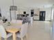 Spacious kitchen featuring ample cabinetry, an island, and modern appliances at 17511 N Kimberly Way, Surprise, AZ 85374