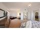 Spacious main bedroom with sitting area and access to additional rooms at 17511 N Kimberly Way, Surprise, AZ 85374