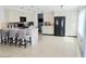 Modern kitchen with island, white cabinets and ample counter space at 17511 N Kimberly Way, Surprise, AZ 85374