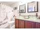 Double vanity bathroom with granite countertops and updated fixtures at 17511 N Kimberly Way, Surprise, AZ 85374