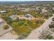 Aerial view of a house and surrounding desert landscape at 30240 N 60Th St, Cave Creek, AZ 85331