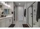 Elegant bathroom boasting double sinks and a walk-in shower at 1859 N Westfall Ln, Casa Grande, AZ 85122