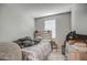 Cozy bedroom with a dresser and window coverings at 1859 N Westfall Ln, Casa Grande, AZ 85122