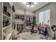 Organized closet with hanging rods and shelving units at 1859 N Westfall Ln, Casa Grande, AZ 85122