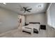 Large bedroom with king-size bed and en-suite bathroom access at 1859 N Westfall Ln, Casa Grande, AZ 85122