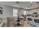 Modern kitchen with white cabinets and stainless steel appliances at 1859 N Westfall Ln, Casa Grande, AZ 85122