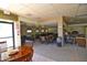 Community room with tables and chairs for gatherings at 14300 W Bell Rd # 505, Surprise, AZ 85374