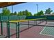 Two well-maintained pickleball courts with nets and fencing at 14300 W Bell Rd # 505, Surprise, AZ 85374