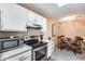 Updated kitchen with stainless steel appliances and white cabinets at 14300 W Bell Rd # 505, Surprise, AZ 85374