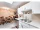 Modern kitchen with stainless steel appliances and white cabinets at 14300 W Bell Rd # 505, Surprise, AZ 85374