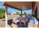 Relaxing covered patio with outdoor furniture at 16222 W Talara Way, Surprise, AZ 85374